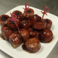 Surf Dog'S Dog Bites · Two  1/4 lb all-beef hot dogs, sliced  and grilled in our special recipe sweet & spicy sauce.