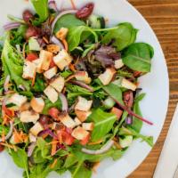 Loaded Green Salad · Mixed greens, fresh mint leaves, tomato, cucumber, red onion, Katamata Olives, julienne carr...