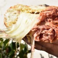 Ham & Cheese Calzone · Chopped Ham, Mozzarella and Homemade Marinara Sauce