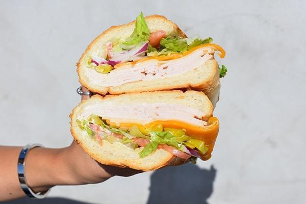 Reg Turkey · Comes with Mustard, Mayo, Lettuce, Tomatoes, Pickles, Pepperoncinis and Onions