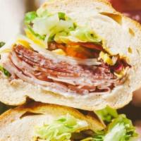 Reg Ham, Salami, Cheese · Comes with Mustard, Mayo, Lettuce, Tomatoes, Pickles, Pepperoncinis and Onions