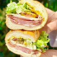 Large Capacola · Comes with Mustard, Mayo, Lettuce, Tomatoes, Pickles, Pepperoncinis and Onions