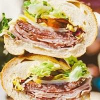 Large Ham, Salami, Cheese · Comes with Mustard, Mayo, Lettuce, Tomatoes, Pickles, Pepperoncinis and Onions