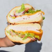 Large Turkey · Comes with Mustard, Mayo, Lettuce, Tomatoes, Pickles, Pepperoncinis and Onions