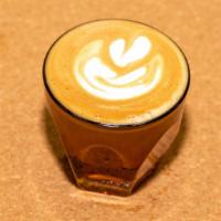 Cortado · Double shot of espresso with equal parts of your choice of milk.