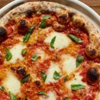 Margherita Pizza · tomato sauce + house made mozzarella + basil  (not available gluten free)