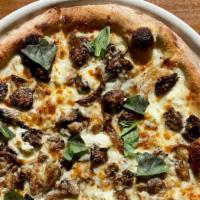 Mushroom + Goat Cheese Pizza · caramelized onion + truffle oil (not available gluten free)