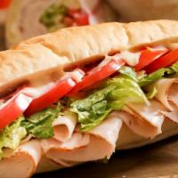 Turkey With Cheese Sub · Turkey, Provolone Cheese, Lettuce, Tomato, Mayonnaise, and Italian Dressing