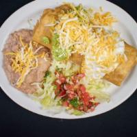 Beef Chimichanga · Served with beans, sour cream, guacamole, lettuce, salsa and cheese.