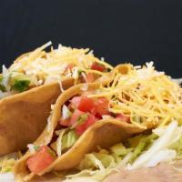 2 Tacos Combination Plate · Beef or chicken. Served with rice and beans.