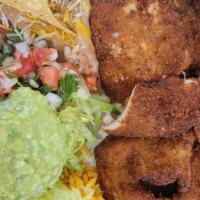 Milanesa Combination Plate · Served with rice and beans.