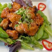 Sesame Chicken Lunch · Deep fried chicken breast in ginger sesame sauce.