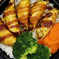 Teriyaki Dumpling Bowl · Deep Fried Chicken Dumplings with Teriyaki Sauce, Steamed Rice Topped with Steamed Fresh Bro...