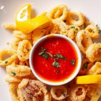 Calamari Fritti · Deep-fried golden calamari, with a special spicy tomato sauce.
