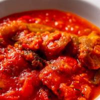 Sausage & Peppers · Sautée sausage and roasted bell peppers in white wine and tomato sauce.