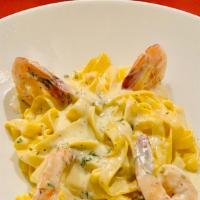 Fettuccine Alessandro · Fettucine pasta with shrimp, in a creamy alfredo sauce.