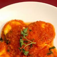 Ravioli Tomato Sauce · Large cheese ravioli in a homemade meat sauce or homemade tomato sauce.