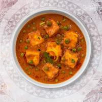 Paneer Tikka Masala · Fried cottage cheese cubes cooked with butter creamy sauce, onions and bell peppers.