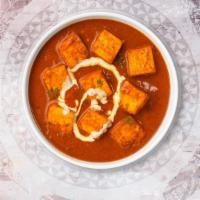Paneer Butter Masala · Fried cottage cheese cooked in creamy butter sauce.