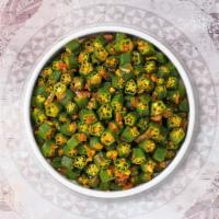 Bhindi Masala  · Crisp-fried okra flavoured with garam masala, coriander, chiles and onions.