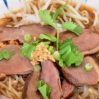 Duck Noodle Soup · Rice noodle with roasted duck, Chinese broccoli, beansprouts, fried garlic, and scallion in ...
