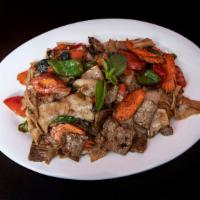 Drunken Noodles (Pad Keemao) · Flat rice noodles with garlic, Thai chili, onions, bell peppers, and Thai basil. Please spec...