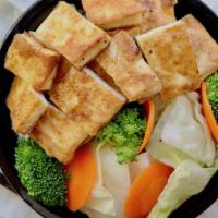 Grilled Tofu Bowl · Grilled Tofu, Rice(White or Brown Rice), Steamed Veggies.