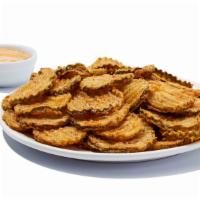 Fried Pickles · 1220 cal. per serving. Homemade, golden brown, cut into thin slices and served with dippin’ ...