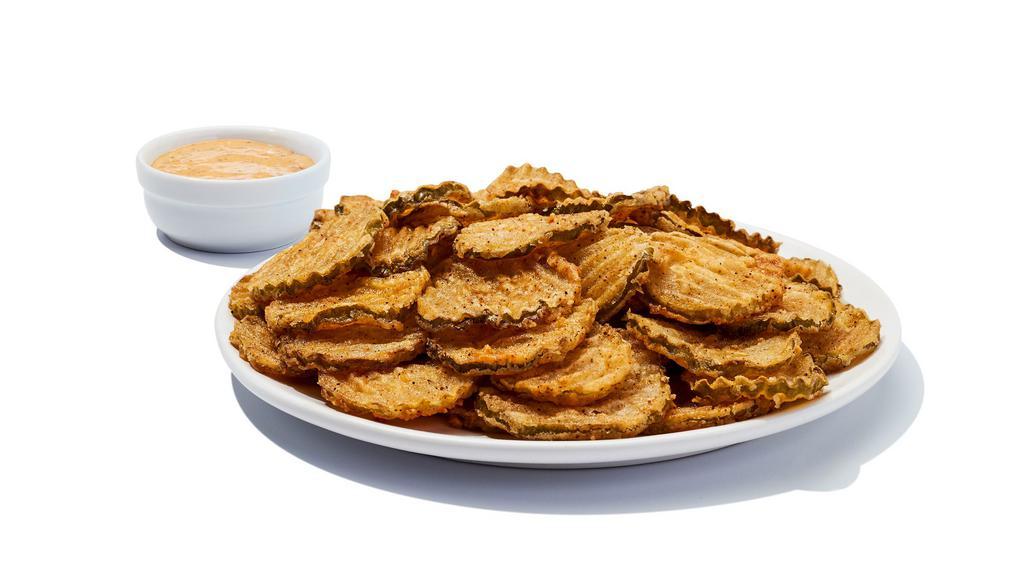 Fried Pickles · Lightly breaded sliced pickles served with our tangy dipping sauce. 1160 cal.