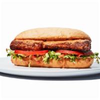Blackened Mahi Sandwich · Blackened mahi served with sliced tomato, coleslaw, and remoulade on a toasted hoagie bun. 1...