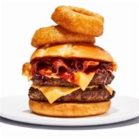 Western Bbq Burger · Two 1/4lb beef patties with BBQ sauce, cheddar cheese, bacon and onion rings on a toasted br...