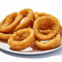 Onion Rings · Sweet Onions, breaded and fried, piled
high and served with your choice of dipping sauce