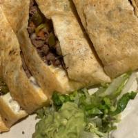 Super Quesadilla · Flour tortillas stuffed with cheese, pico de gallo, jalapeños, and your choice of meat. Sour...