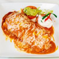 Wet Burrito · Includes rice and beans inside the burrito. Comes with enchilada sauce and cheese on top., P...