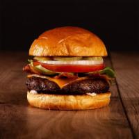 The Bacon Cheeseburger · Beef patty, bacon, lettuce, tomato, onion, pickles, mayo, and melted cheddar cheese on your ...