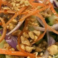 Cucumber Salad · Cucumber, red onion, carrot, peanut with sweet and sour sauce.