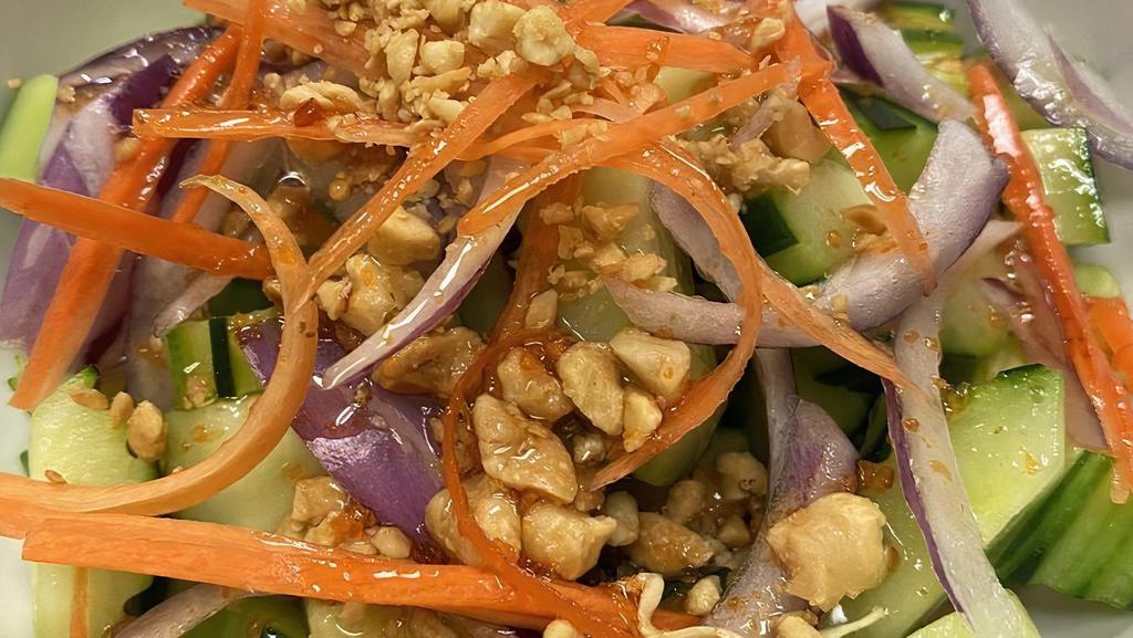 Cucumber Salad · Cucumber, red onion, carrot, peanut with sweet and sour sauce.