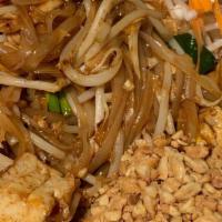 Pad Thai · Stir fried thin rice noodles, egg, green onion, bean sprout, tofu, side of peanut, lime with...