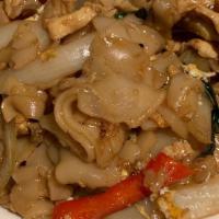 Drunken Noodles · Stir fried flat rice noodles, egg, green bean, onion, cabbage, bell pepper, basil with spicy...