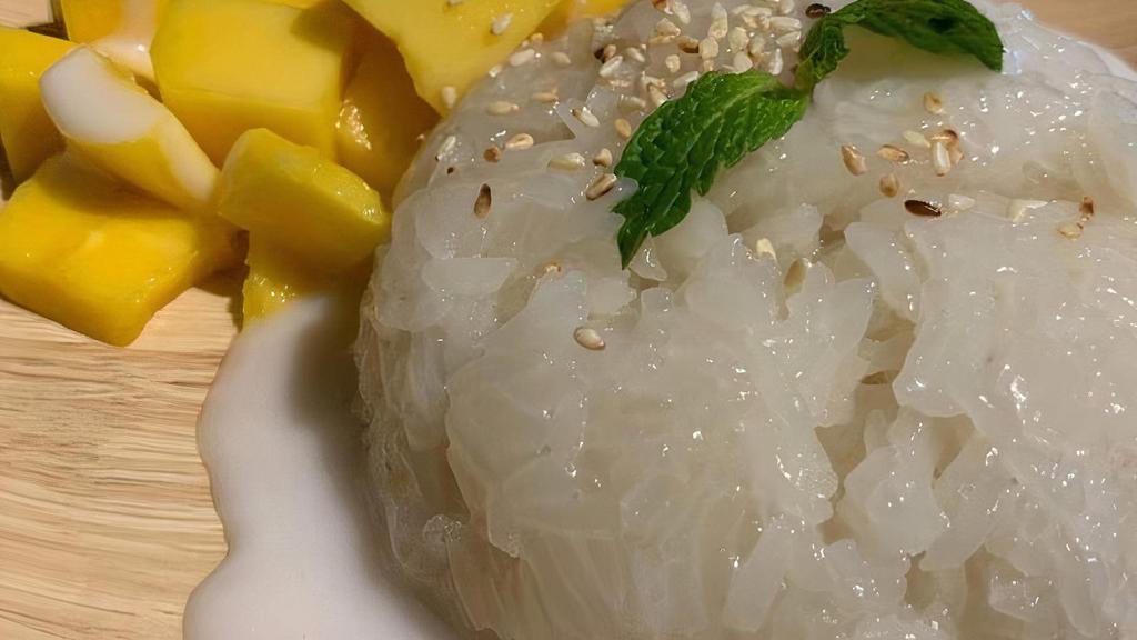 Mango Sticky Rice · Mango, sweet sticky rice, mint, white sesame with coconut cream.