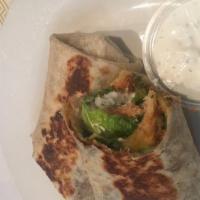 Salmon Wrap · Spicy. Yogurt sauce, hot sauce, onions, greens and salmon wrapped in lavash bread.