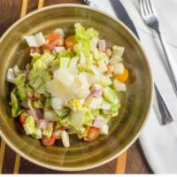 Tritatto Italiano (Italian Chopped Salad) · Chopped romaine hearts, garbanzo beans, cherry tomatoes, cucumber and mortadella with red wi...