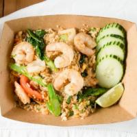 Thai Style Fried Rice · White rice stir fried with a soy sauce blend, egg, tomato, Chinese broccoli, and onion serve...
