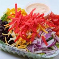Fiesta Salad · romaine & iceberg lettuce mix with diced tomatoes, sliced red onions, black beans, corn, che...