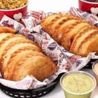 Original Family Pack · Includes 12 Original Empanadas*, 2 lg sides, 2 lg dipping sauces. *Substitute specialty or d...
