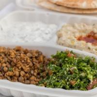 Vegetarian Combo · Includes four items from our vegetarian and salads selection and two pita breads.