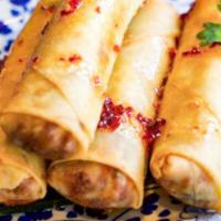 Crispy Egg Rolls · Stuffed with vermicelli, cabbage, carrots, mushrooms and flash fried served with sweet chili...