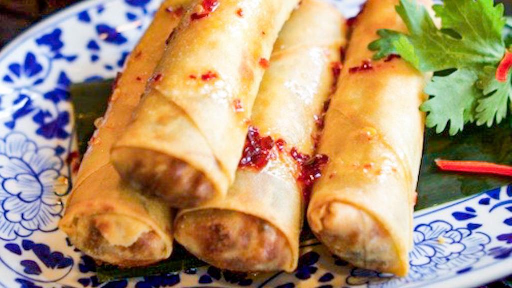 Crispy Egg Rolls · Stuffed with vermicelli, cabbage, carrots, mushrooms and flash fried served with sweet chili sauce.