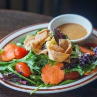 House Salad · Mixed greens, romaine hearts, cucumbers, grape tomatoes, carrots and crispy noodle croutons ...