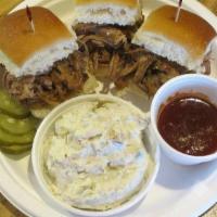 Pulled Pork Sliders · Three juicy, tender, and spicy sliders. Comes with 1 side order and BBQ sauce and sliced pic...